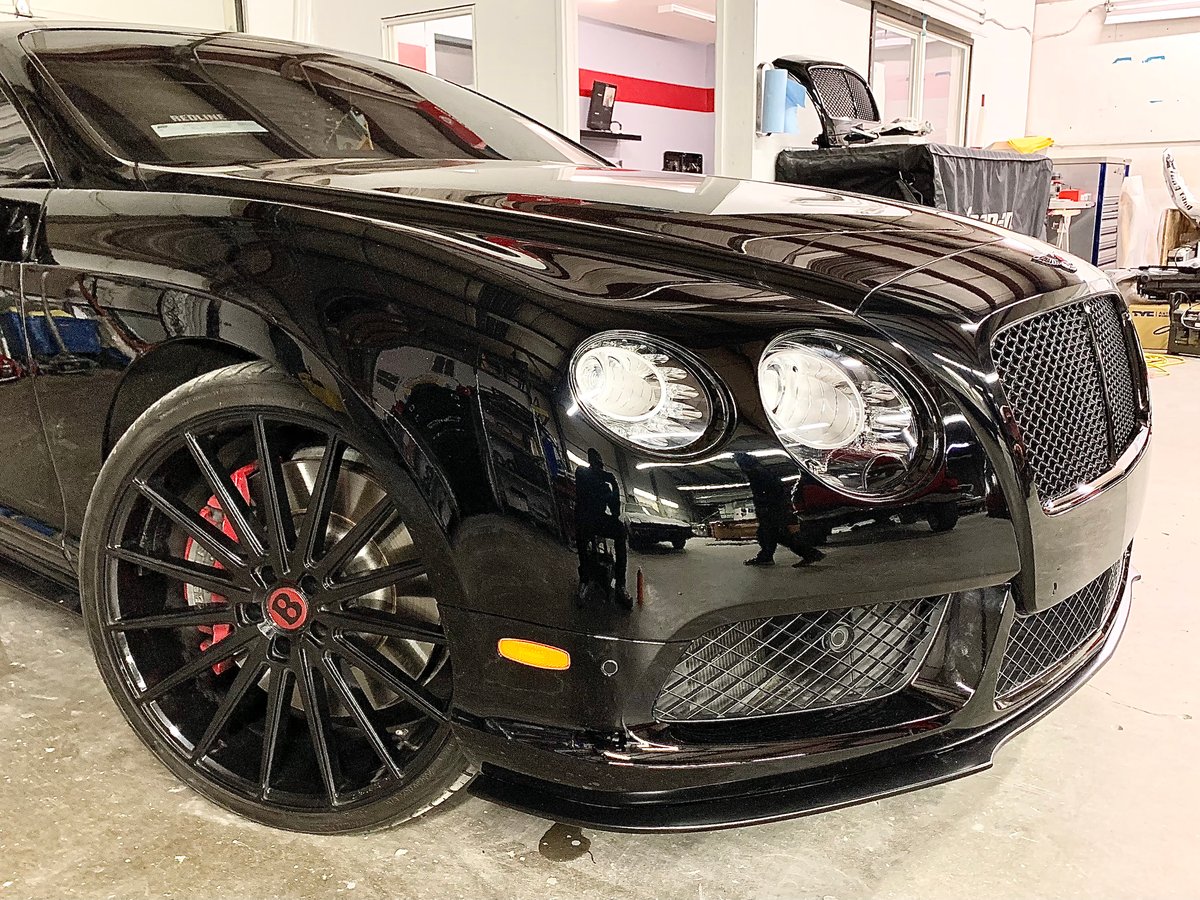 Black Bentley after collision repair at Gresham Collision Repair